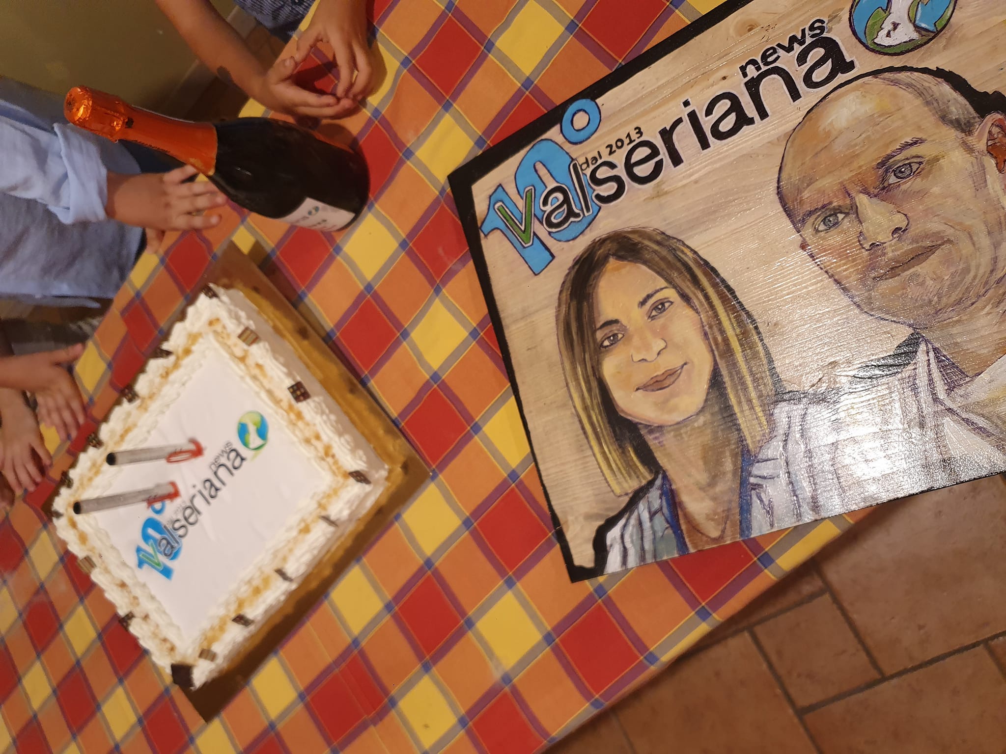 la torta e un quadro realizzato in occasione dei 10 anni di Valseriana News